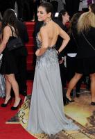 mila_kunis_at_71st_annual_golden_globe_awards_13.jpg