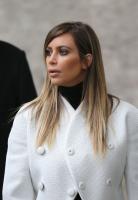kim_kardashian_leaves_the_museum_of_modern_art_in_paris_13.jpg