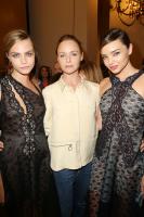 Cara_Delevingne_Stella_McCartney_Miranda_Kerr_shared_moment_backstage.jpg