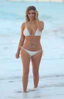 kim_kardashian_in_bikini_at_a_beach_in_miami_2.jpg