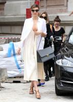 Miranda_Kerr_topped_her_plunging_midi_dress_crisp_white_blouse_outside_shows_Paris_Fashion_Week.jpg