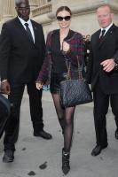 Outside_Chanel_show_during_Paris_Fashion_Week_Miranda_Kerr_showed_off_black_quilted_Chanel_bag_sophisticated_checkered_jacket.jpg