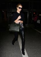 rosie_huntington_whiteley_arrives_at_lax_airport_5.jpg
