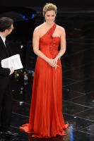 While_stage_Festival_di_Sanremo_Italy_Bar_Refaeli_dazzled_red_one_shoulder_gown_diamond_jewelry.jpg