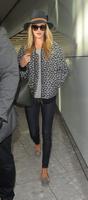rosie_huntington_whiteley_arrives_at_heatrow_airport_in_london_4.jpg