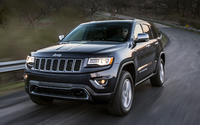 2014_Jeep_Grand_Cherokee_Diesel_front_three_quarters_in_motion_view.jpg