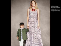 Doutzen_Kroes_wearing_Born_Free_dress_by_Marni_with_son_Phyllon_wearing_Born_Free_tee_by_Theory.jpg