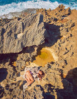 joan_smalls_09_porter_summer_escape_2015_by_ryan_mcginley.jpg