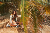 joan_smalls_04_porter_summer_escape_2015_by_ryan_mcginley.jpg