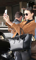 Miranda_Kerr__Charles_de_Gaulle_Airport__08.jpg
