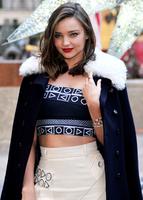 miranda_kerr_at_swarovski_star_raising_for_2015_rockefeller_center_christmas_tree_1.jpg