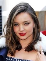 miranda_kerr_swarovski_star_raising_for_2015_rockefeller_center_christmas_tree_in_new_york_city_6.jpg