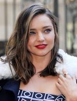 miranda_kerr_swarovski_star_raising_for_2015_rockefeller_center_christmas_tree_in_new_york_city_11.jpg
