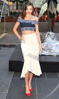 miranda_kerr_swarovski_star_raising_for_2015_rockefeller_center_christmas_tree_in_new_york_city_19.jpg