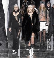 31266DA300000578_3445188_Hadid_went_shirtless_and_kept_the_coat_zippered_together_at_a_sm_m_113_1455335362538.jpg