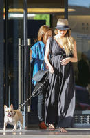 Chrissy_Teigen_in_Black_Long_Dress__12.jpg