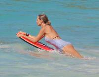 heidi_klum_in_swimsuit_beach_in_the_caribbean_8_9_2016_7.jpg